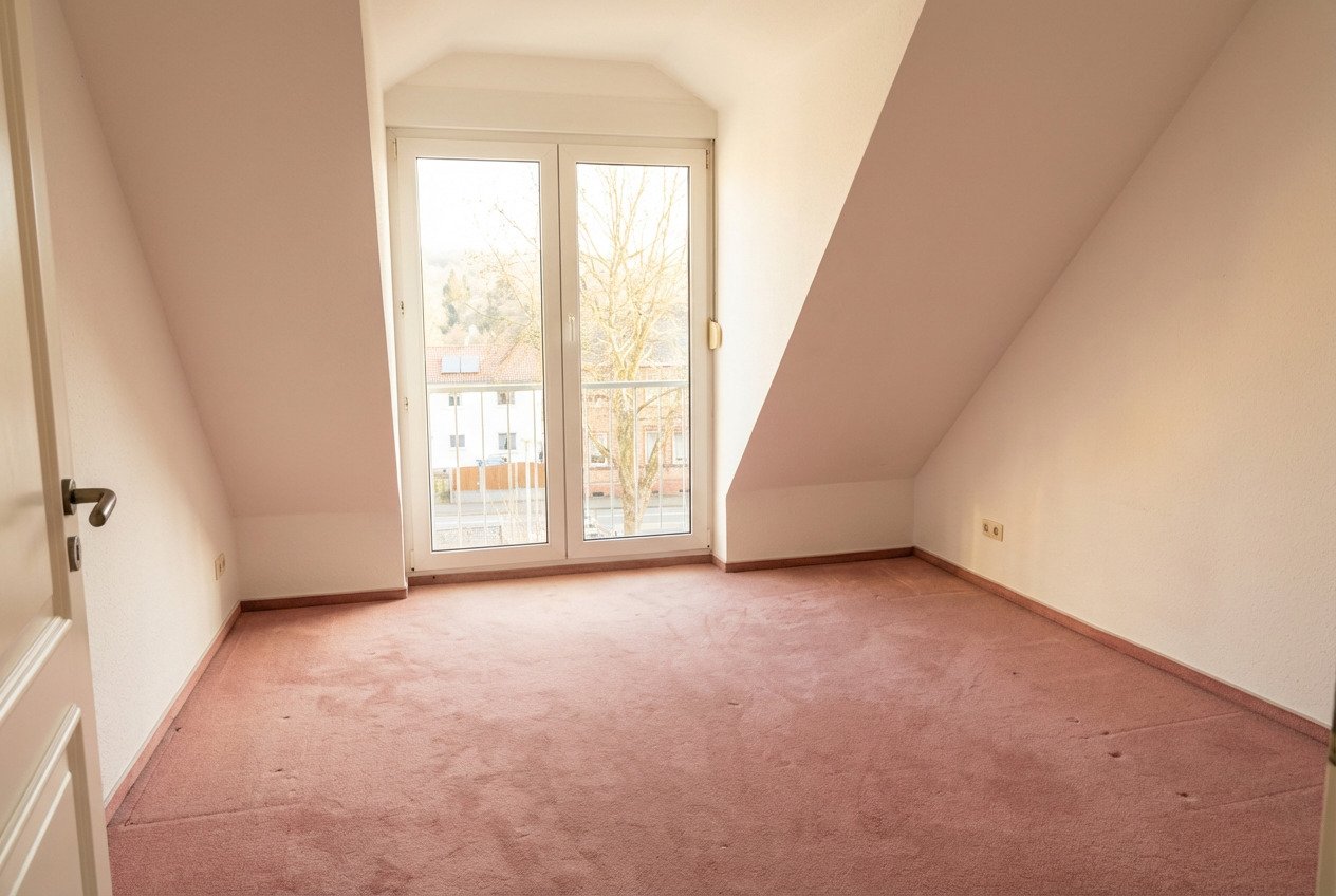 Dachgeschosswohnung mit Balkon